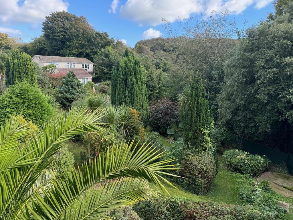 Lot: 59 - FREEHOLD GROUND RENTS FOR EXTENSIVE CHALET SITE - Elevated view of gardens